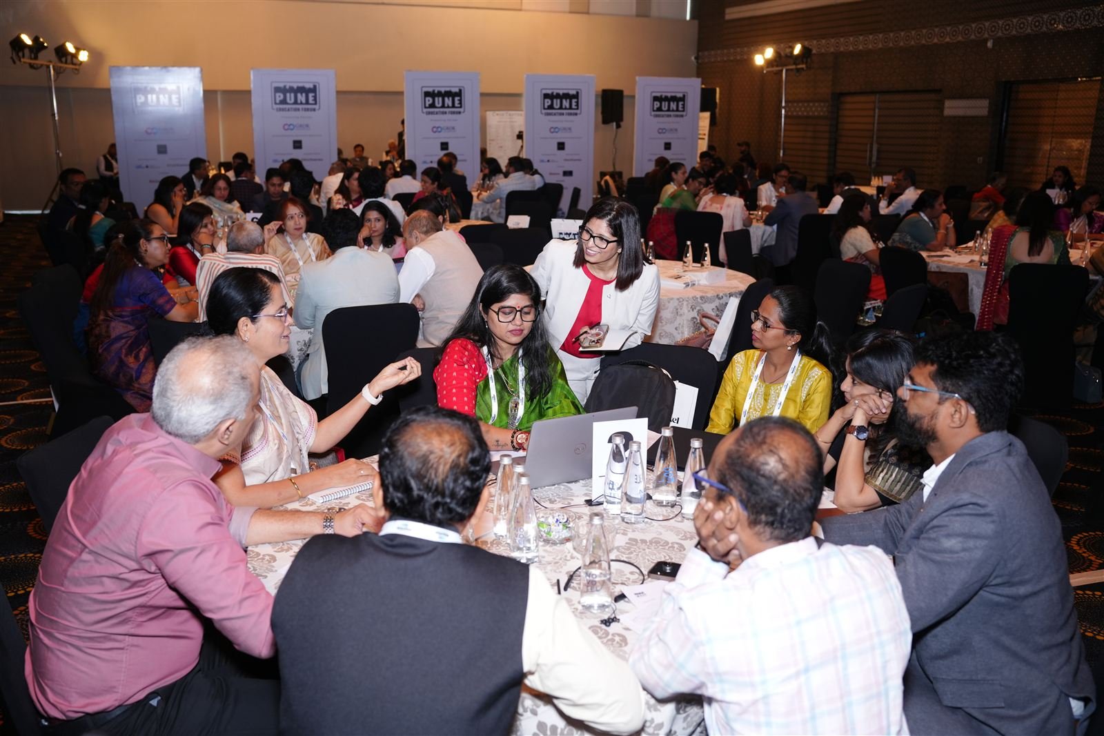 Education leaders participating in a focused roundtable discussion